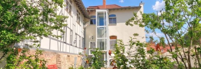 1-Zimmer-Wohnung mit EBK, Stellplatz und Gartennutzung