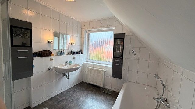 Einziehen & wohlfühlen: Modernisiertes Einfamilienhaus mit Wintergarten in Varel-Büppel – Foto 9