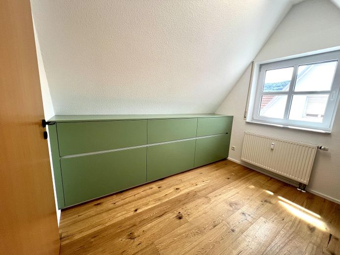 Appartamento maisonette di 4,5 locali con balcone e garage – Zimmer 2
