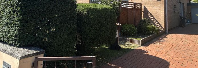 Provisionsfrei: Freistehendes Einfamilienhaus mit 154 m² Wohnfläche und Wintergarten in Reinbek – Hausansicht Vorderseite