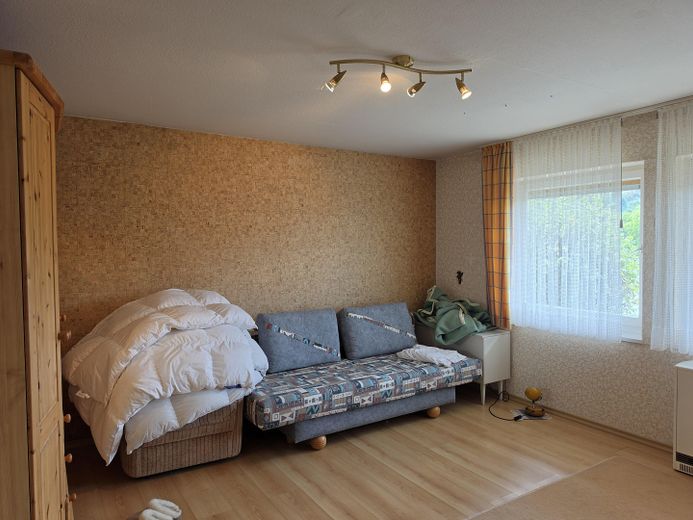 Provisionsfrei: Großzügiges Einfamilienhaus in ruhiger Aussichtslage mit teilbarem Großgrundstück – Zimmer Ost im Kellergeschoss