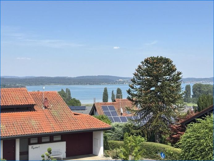 Straordinario appartamento mansardato di 4,5 locali con splendida vista sul lago, terrazze sul tetto e garage! – Foto 1