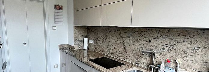 Küche Miele Steinverkleidung