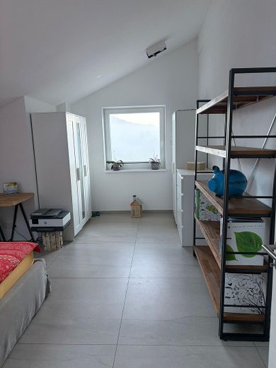 Appartamento mansardato in posizione premium con vista panoramica – Schlafzimmer