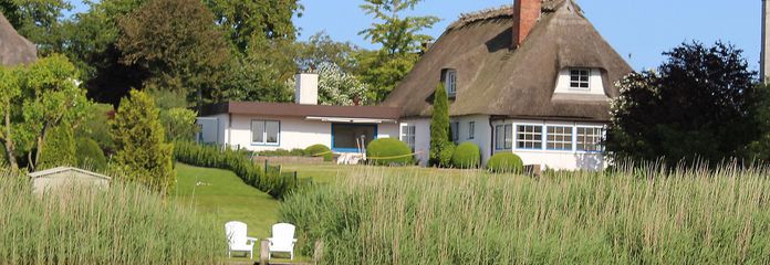 Reetvilla mit Schleizugang