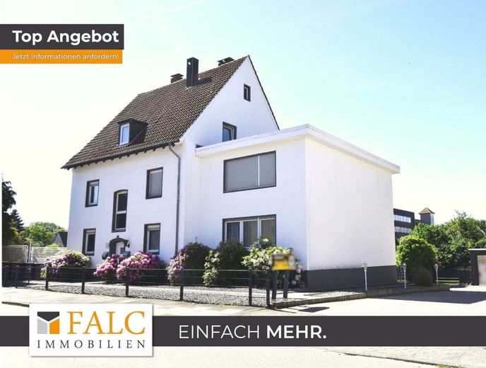 Reserviert! Modernisiertes Dreifamilienhaus mit großem Grundstück und Wintergarten – Außenansicht