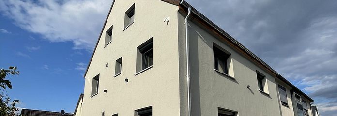 Solide Kapitalanlage mit Zukunft 7,4% Rendite— Mehrfamilienhaus und Baugrundstück in einem Paket