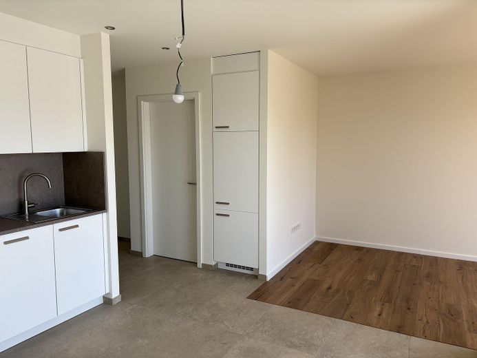 Exklusive 2-Zimmer-Neubauwohnung mit Balkon – Wohnen / Kochen
