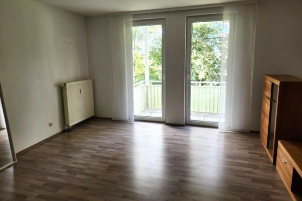 Freiwerdende Familienwohnung mit Balkon und Tiefgaragenstellplatz