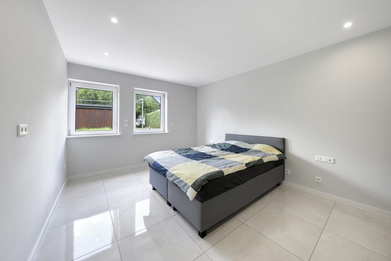 Modernisiertes Mehrgenerationenhaus mit zwei Einheiten in Bad Neustadt-Herschfeld – Schlafzimmer UG