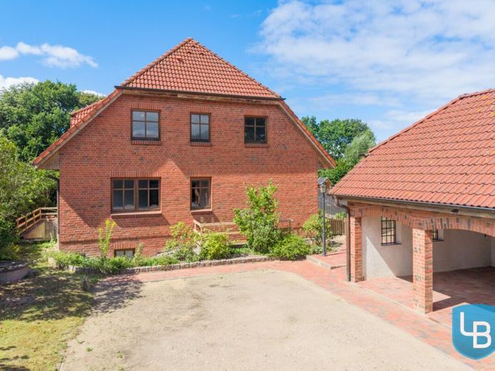 Einfamilienhaus mit ELW und großem Garten – viel Raum für Ihre Wohnideen – Foto 1