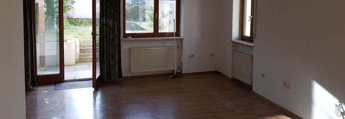 Interessante appartamento al piano terra di 1,5 locali con giardino, vicino alla stazione/centro LL