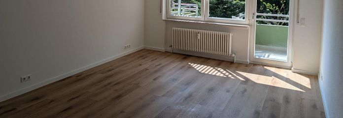 Hochwertig kernsanierte 3-Zimmer-Wohnung mit Balkon & Garage