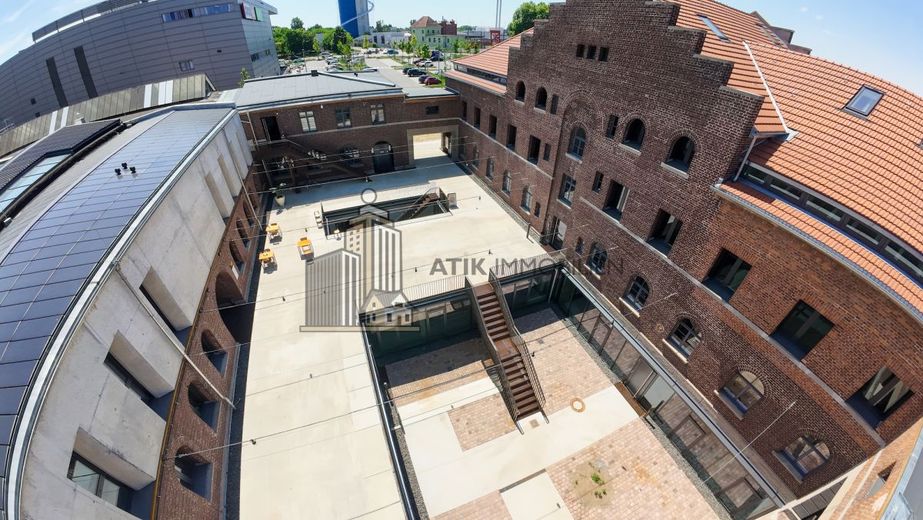 ATIK: Neubau mit Holzmassivdachstuhl im historischen Bahn-Betriebswerk Heidelberg – Drohnenaufnahme