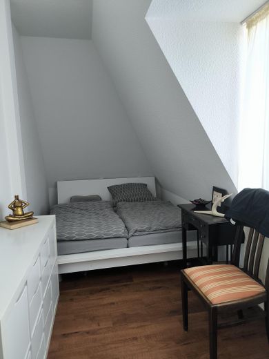 Schlafzimmer mit Bett