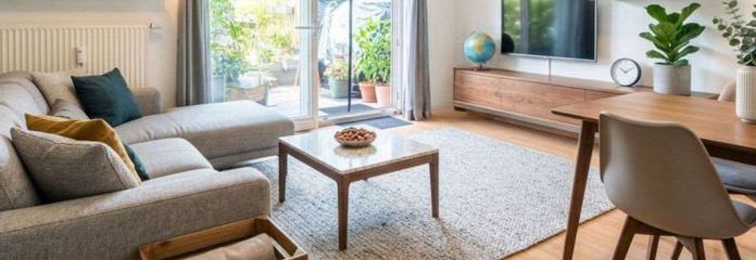 Freiburg-Rieselfeld – Vermietete 2-Zimmer-Erdgeschosswohnung mit zwei Terrassen, Garten & Stellplatz