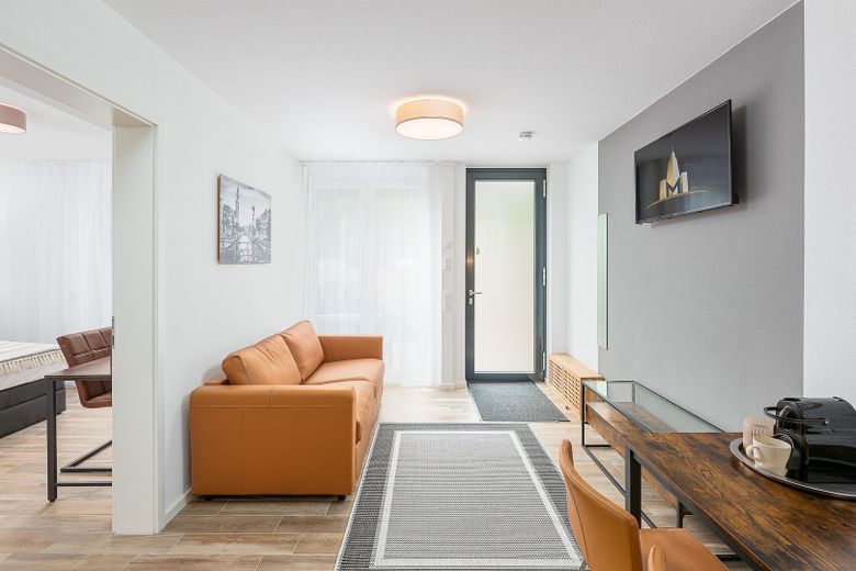 Neubau: vollmöblierte Businessapartments mit Panoramablick – Apartment 4 Wohnzimmer