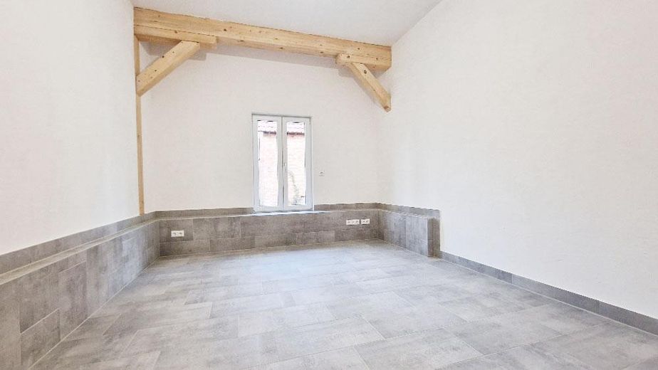 EG Wohnung mit Terrasse | NACHHALTISGTE Immobilie Wolfsburgs, Lehmbau, PV - Autarkie, Appsteuerung – Zimmer 1