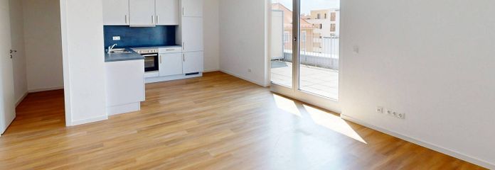 Moderniteit en comfort: nieuwbouwappartement met 4 kamers, inbouwkeuken en groot dakterras – Ansicht I: Wohn- und Esszimme…