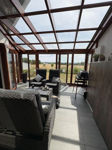 Exclusiva casa unifamiliar con invernadero, fotovoltaica, aire acondicionado, vistas lejanas, ubicación privilegiada de Neuwied-Heimbach-Weis – Wintergarten - EG