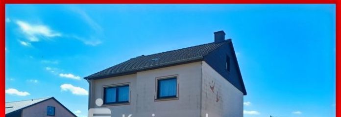 Freistehendes Einfamilienhaus mit Garage in schöner Lage