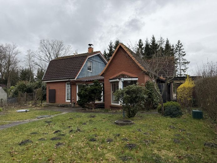 Kapitalanlage in Kutenholz - 6% Bruttorendite erzielbar – Außenansicht vom Garten