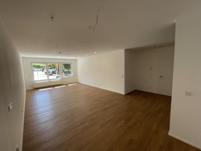 Teraslı 2 odalı yeni bina dairesi (81 m²) – zemin katta ilk kullanım | Recklinghausen-Nord – Wohnzimmer