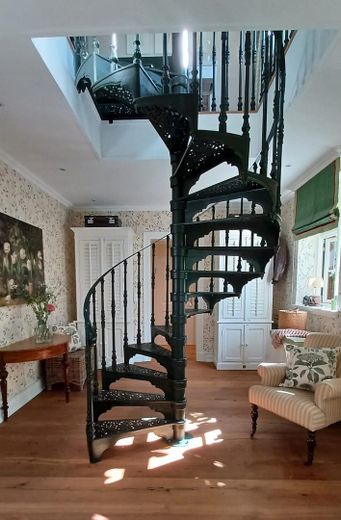 Eisenwendeltreppe in das 1.OG