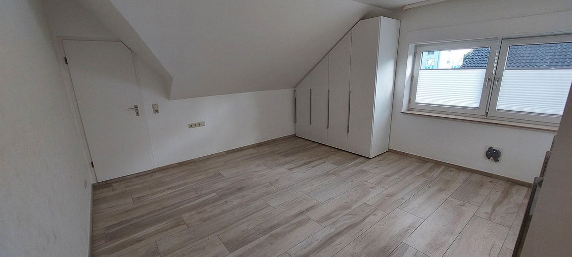 Schlafzimmer mit Einbauschrank