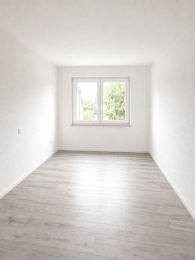 Appartamento di 3,5 locali ristrutturato con balcone e riscaldamento a pavimento – Schlafzimmer