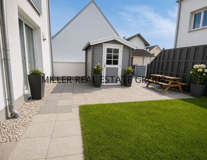 Moderne 4-Zimmer-Erdgeschosswohnung mit Privatgarten, Terrasse &amp; zwei Tiefgaragenstellplätzen! – Gartenbereich