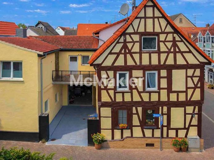 Mehrfamilienhaus mit 3 WE + 1 GE, Ausbaupotenzial in gefragter Lage Groß-Zimmern – Foto 1