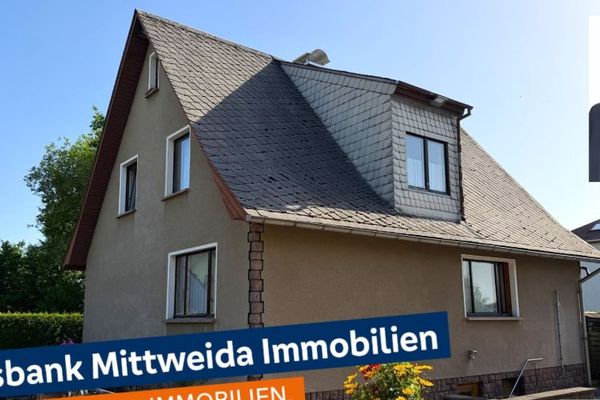 Einfamilienhaus mit großem Grundstück und vielseitigem Nebengebäude in ruhiger Lage