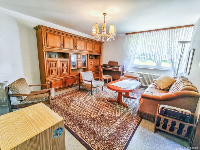Großzügiges Einfamilienhaus mit Einliegerwohnung - TOP-Familienleben auf dem Hagen bei Bad Pyrmont! – Wohnzimmer Einliegerwohnung