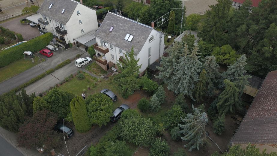 Charmantes Einfamilienhaus mit Balkon, Garage und Garten – Ihr neues Zuhause in Prausitz – Luftbild