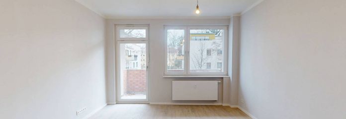 Vollständig renovierte 2-Zimmer-Wohnung mit BALKON, saniertem Bad und moderner EBK – Ansicht I: Wohn- und Esszimmer