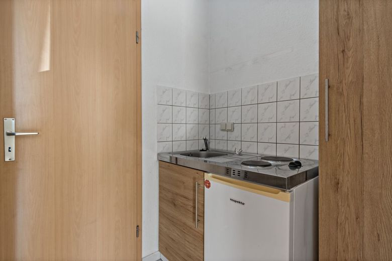 1-Raumwohnung mit Einbauküche in zentraler Lage! – Küche