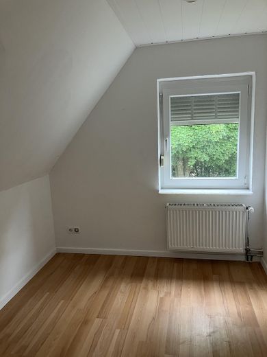 Charming single-family house in a quiet location in Möhlenwarf – 1. Schlafzimmer DG
