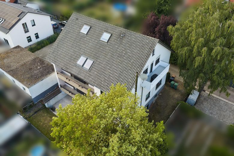 Kapitalanlage | 4 ETW im Paket | 488 m² Wohnfläche | 4 Garagen | Mietsteigerungspotenzial – Süd-/Ost-Ansicht