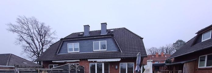 NEUSTADT OT POGGENHAGEN: Schöne Doppelhaushälfte in ruhiger Feldrandlage mit guter Anbindung – Rückansicht DHH