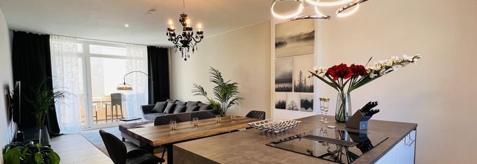 Wohnzimmer mit Küche