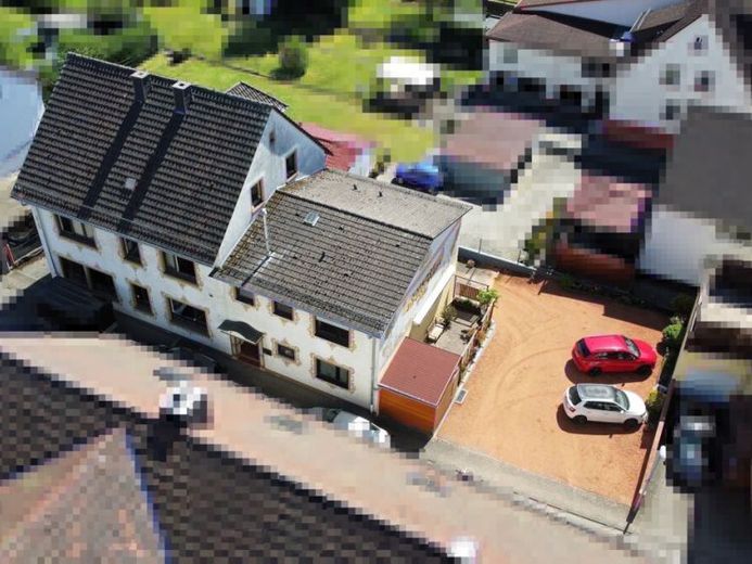 Wohn- und Geschäftshaus – Foto 1