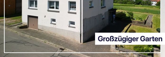 Gartenparadies mit Weitblick – großzügiges Zweifamilienhaus in Krottelbach