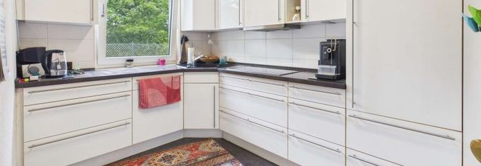 Gezinsgeluk op drie niveaus – goed onderhouden tussenwoning met tuin, terras en garage