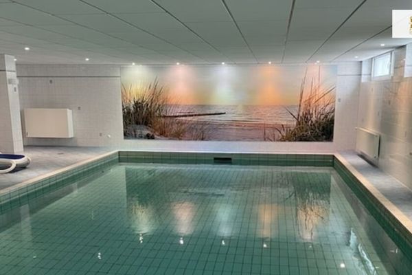 Modern condominium/holiday apartment in a TOP location in the North Sea resort of Cuxhaven-Duhnen with swimming pool/sauna/parking space/furnished