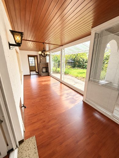 Wolnostojący bungalow dla 1 rodziny z garażem w Kleinostheim Waldstadt bez pośrednika – Wintergarten mit Kamin