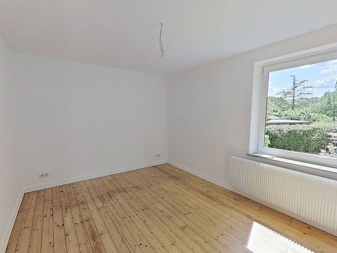 Un luogo in cui sentirsi bene: appartamento al piano terra di 2 locali con bagno con vasca – Ansicht I: Wohn- und Esszimmer