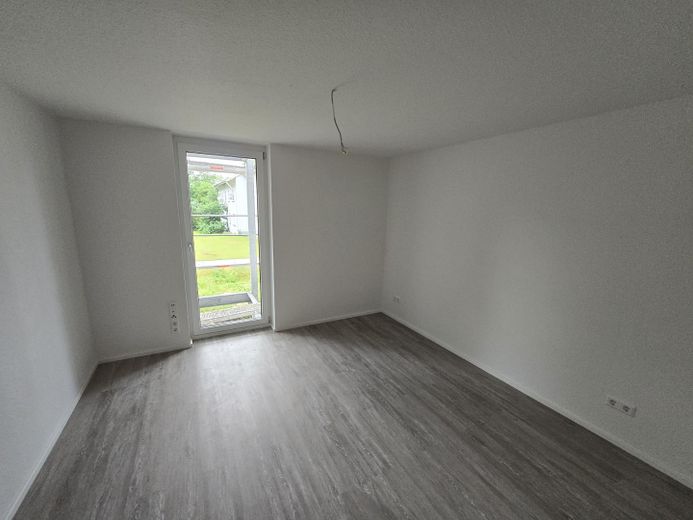 Moderno appartamento di 2,5 locali al piano terra, conforme allo standard KfW-55-EE – efficiente dal punto di vista energetico e dotato di finiture di pregio – Schlafzimmer