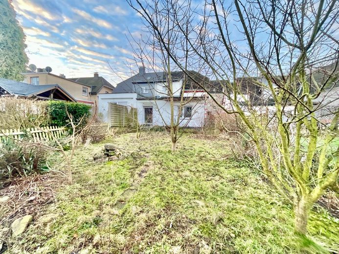 ein neues Zuhause - auch für große Familien - zum fairen Preis – Gartenansicht