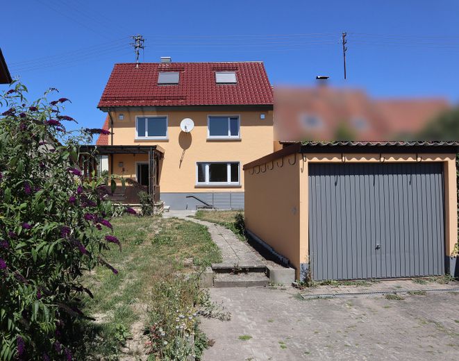 Einfamilienhaus mit kleinem Garten und Garage in Heuchlingen – Foto 1